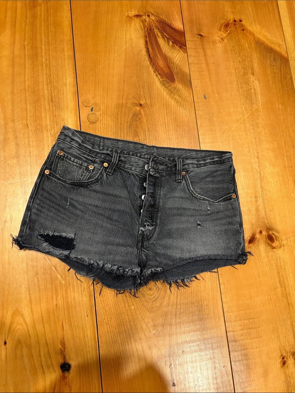 Levi’s Black Distressed High-Waist Denim Cutoff Shorts